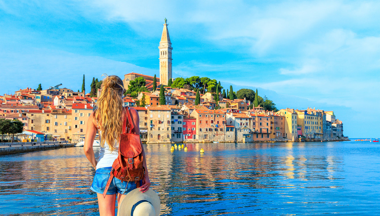 young-woman-looking-at-amazing-ocean-scenery